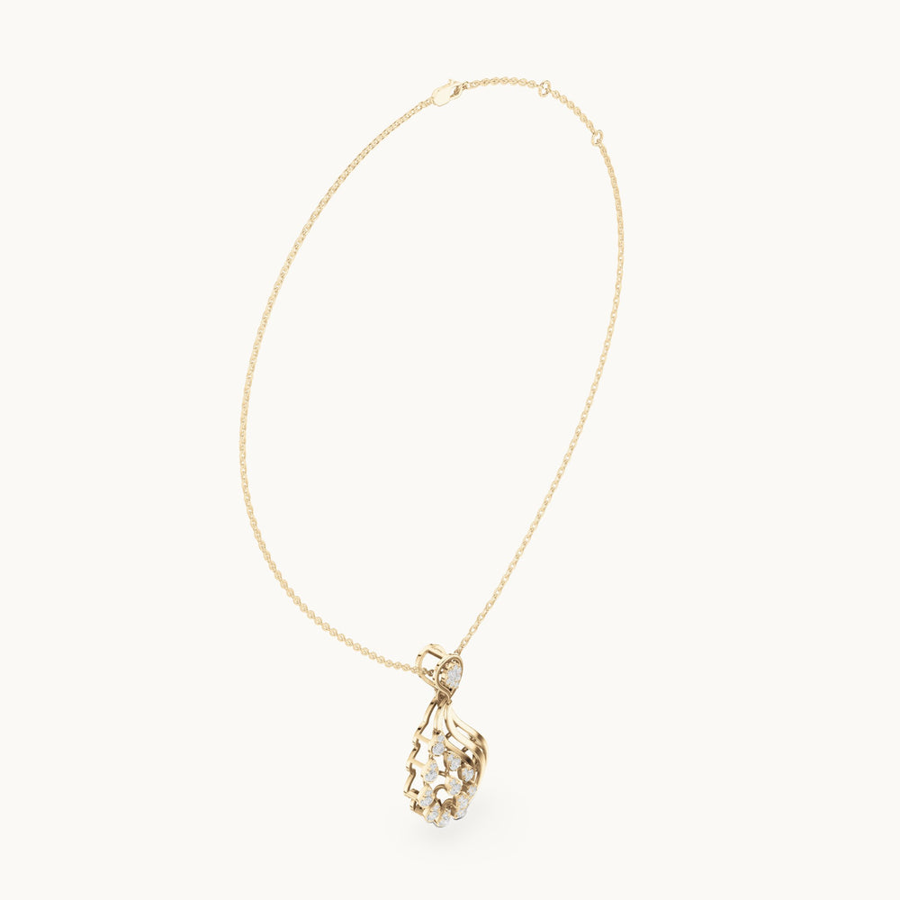 Round lab-grown diamond paisley cluster pendant in yellow gold, 0.689 CT TW, view 1
