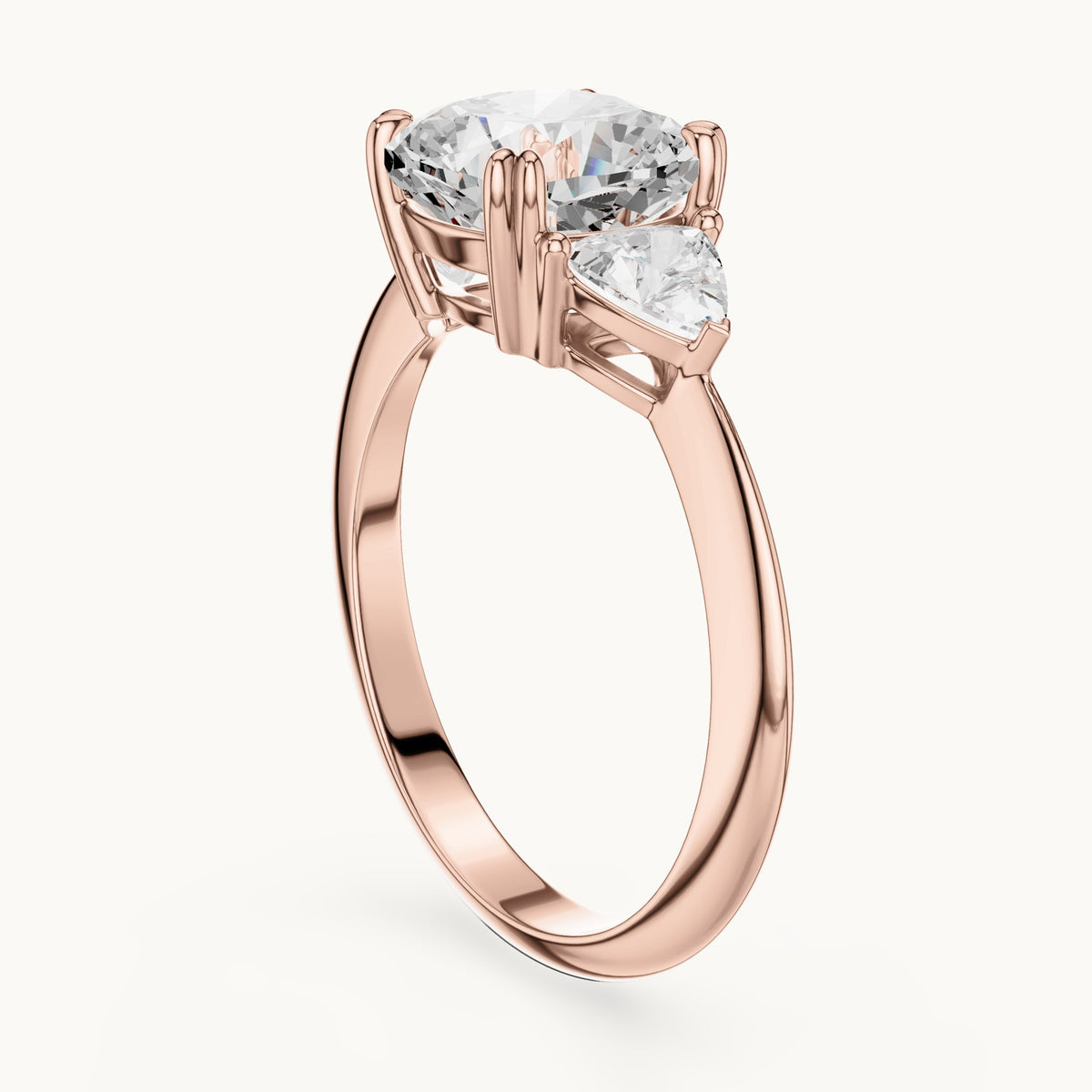 Cushion-cut and trillion lab-grown diamond three-stone engagement ring with trillion side stones in rose gold, 3.12 CT TW, view 1