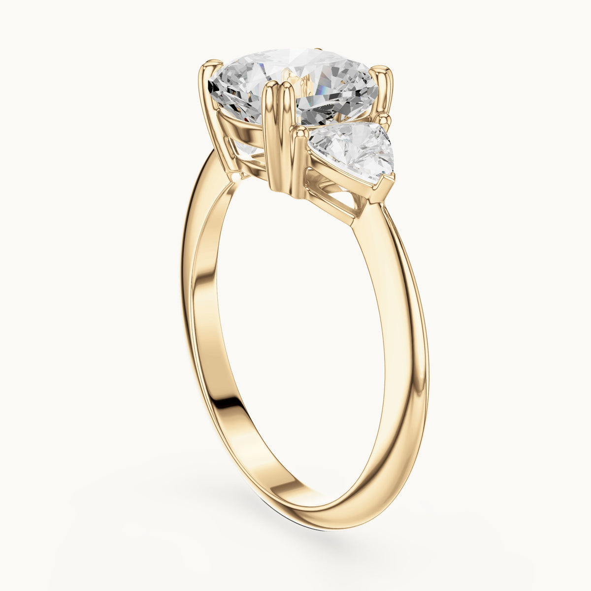 Cushion-cut and trillion lab-grown diamond three-stone engagement ring with trillion side stones in yellow gold, 3.12 CT TW, view 1