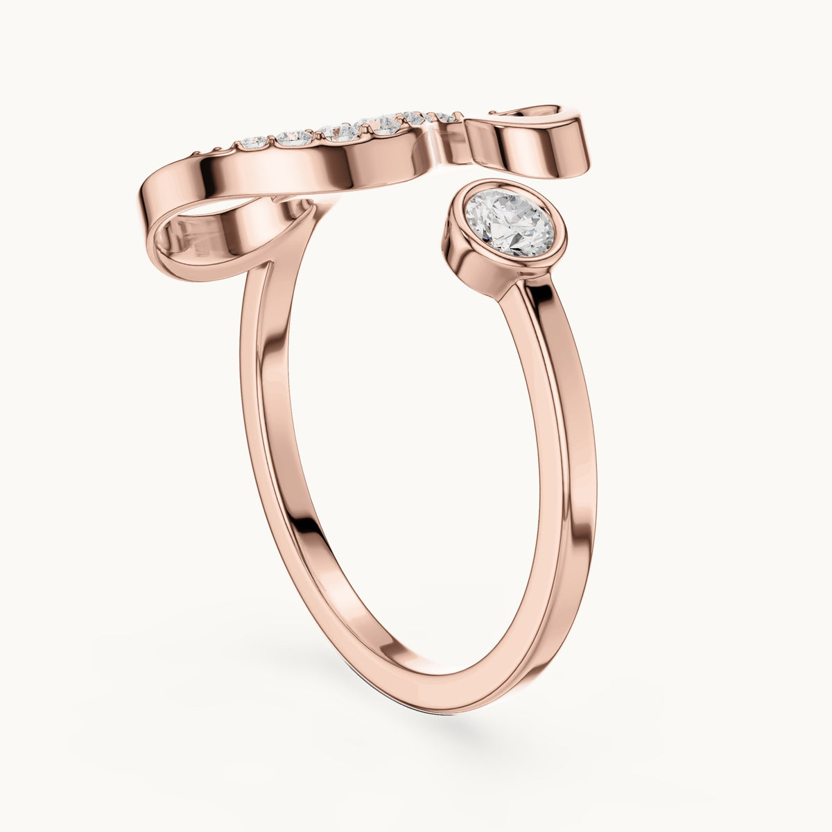 Round lab-grown diamond swirl bypass ring with bezel diamond in rose gold, 0.228 CT TW, view 1