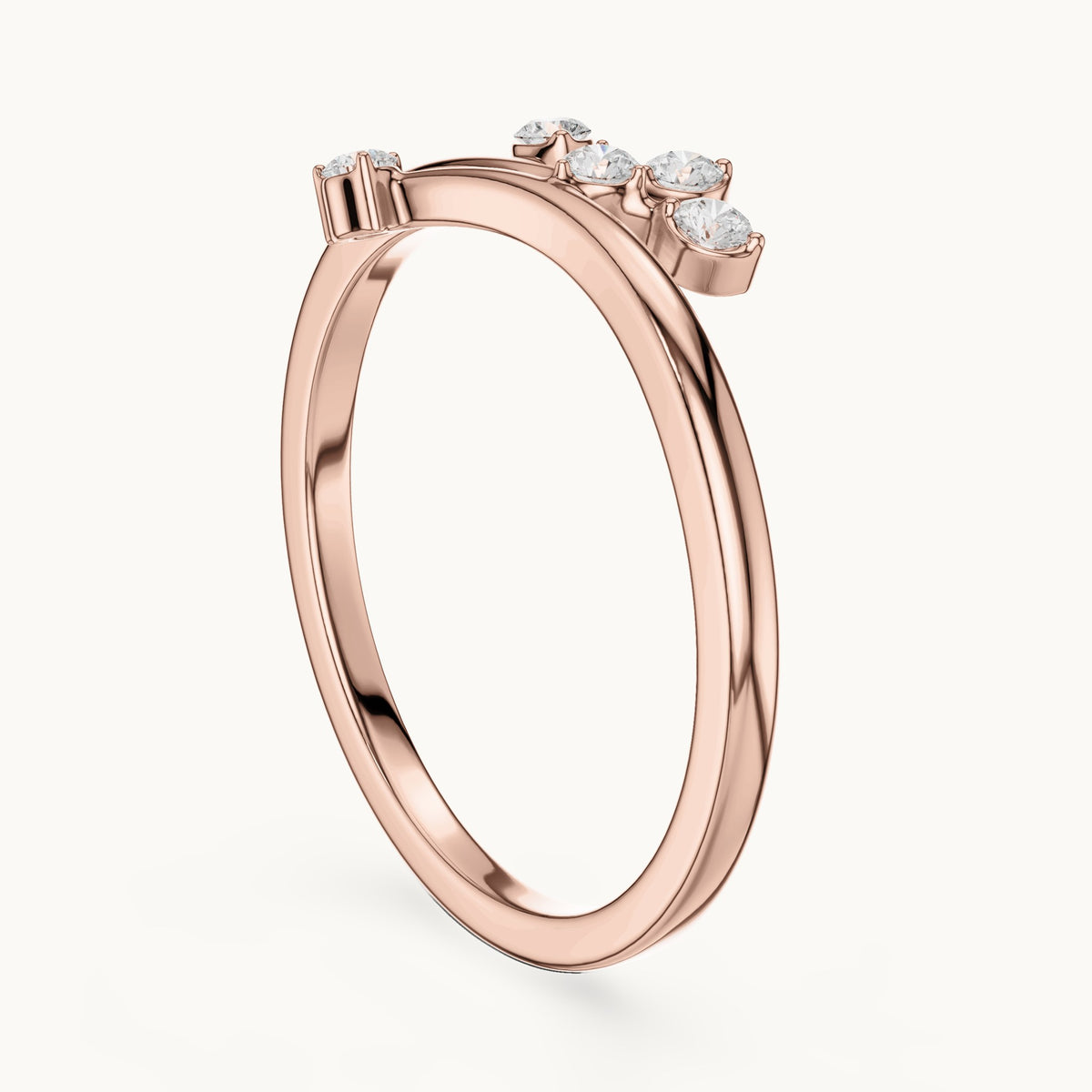 Round lab-grown diamond scattered diamond bypass ring in rose gold, 0.12 CT TW, view 1