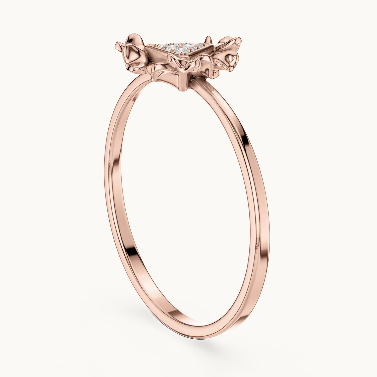 Round lab-grown diamond triangle cluster ring in rose gold, 0.024 CT TW, view 1