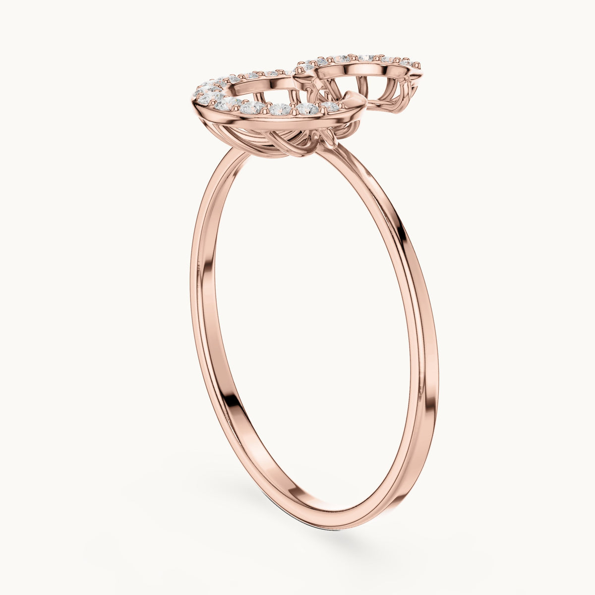 Round lab-grown diamond swirl ring in rose gold, 0.101 CT TW, view 1