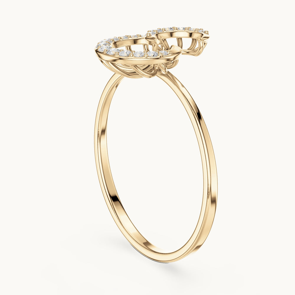 Round lab-grown diamond swirl ring in yellow gold, 0.101 CT TW, view 1