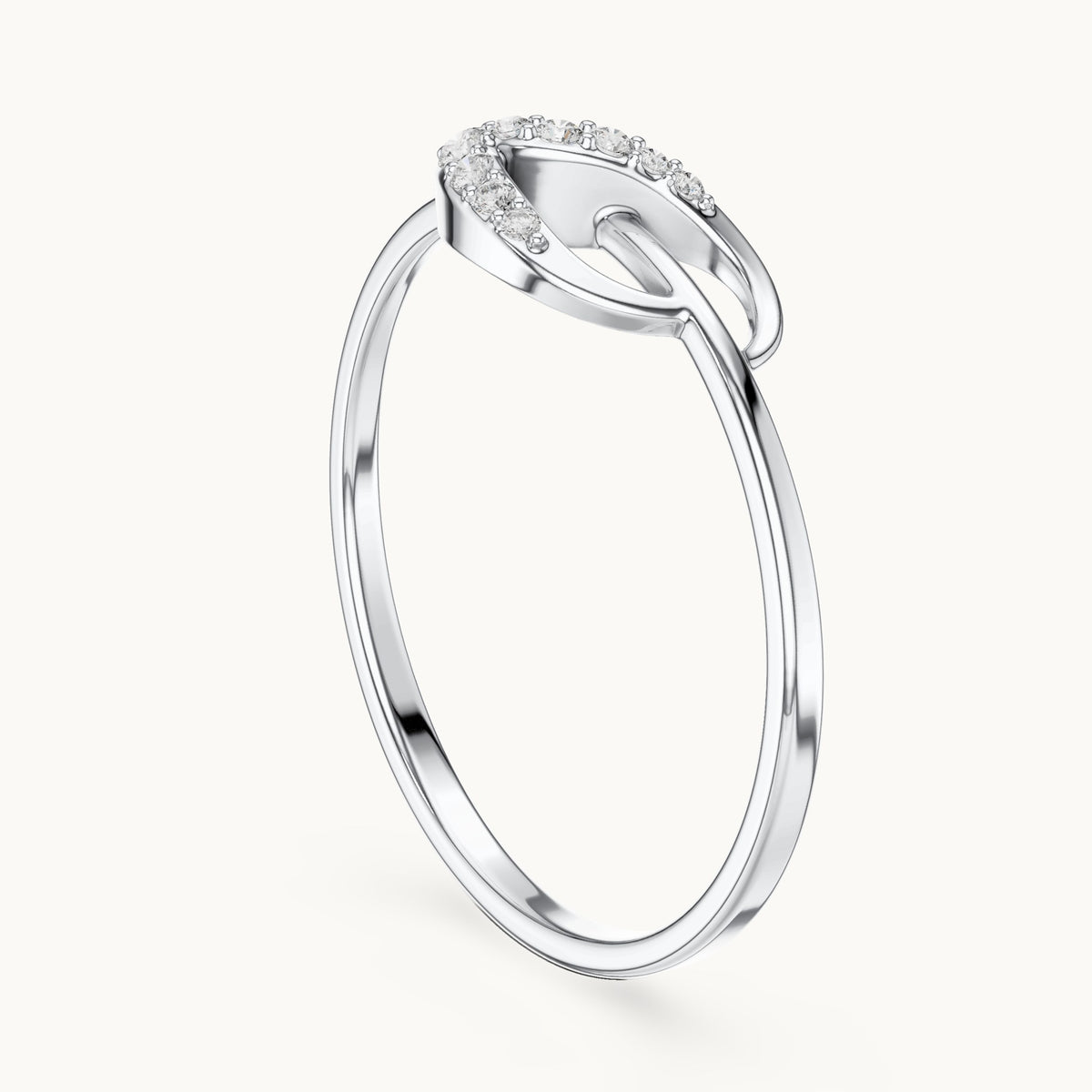 Round lab-grown diamond swoosh bypass ring in white gold, 0.061 CT TW, view 1