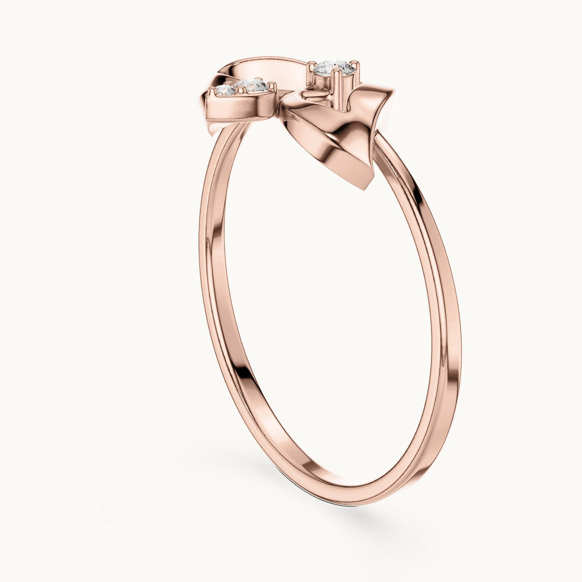 Round lab-grown diamond arch and drop three-stone ring in rose gold, 0.04 CT TW, view 1