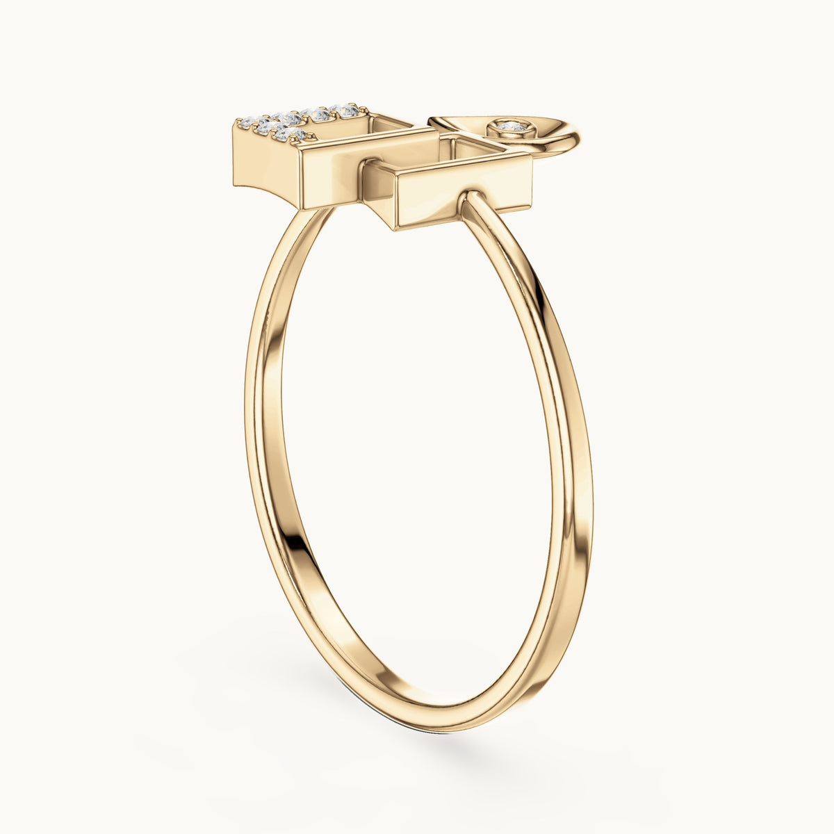 Round lab-grown diamond teardrop and interlocking squares bypass ring in yellow gold, 0.028 CT TW, view 1