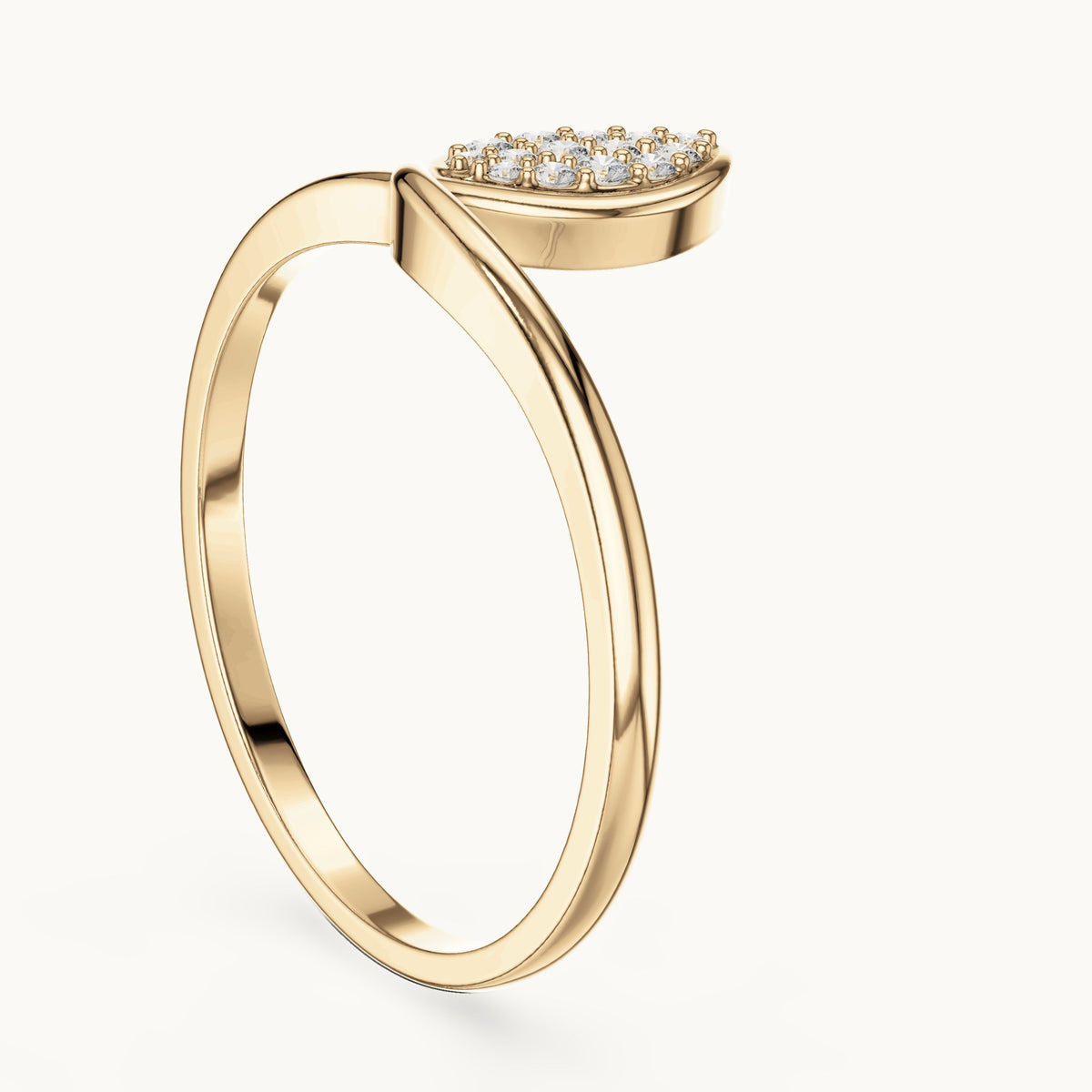 Round lab-grown diamond pavé paisley bypass ring in yellow gold, 0.093 CT TW, view 1