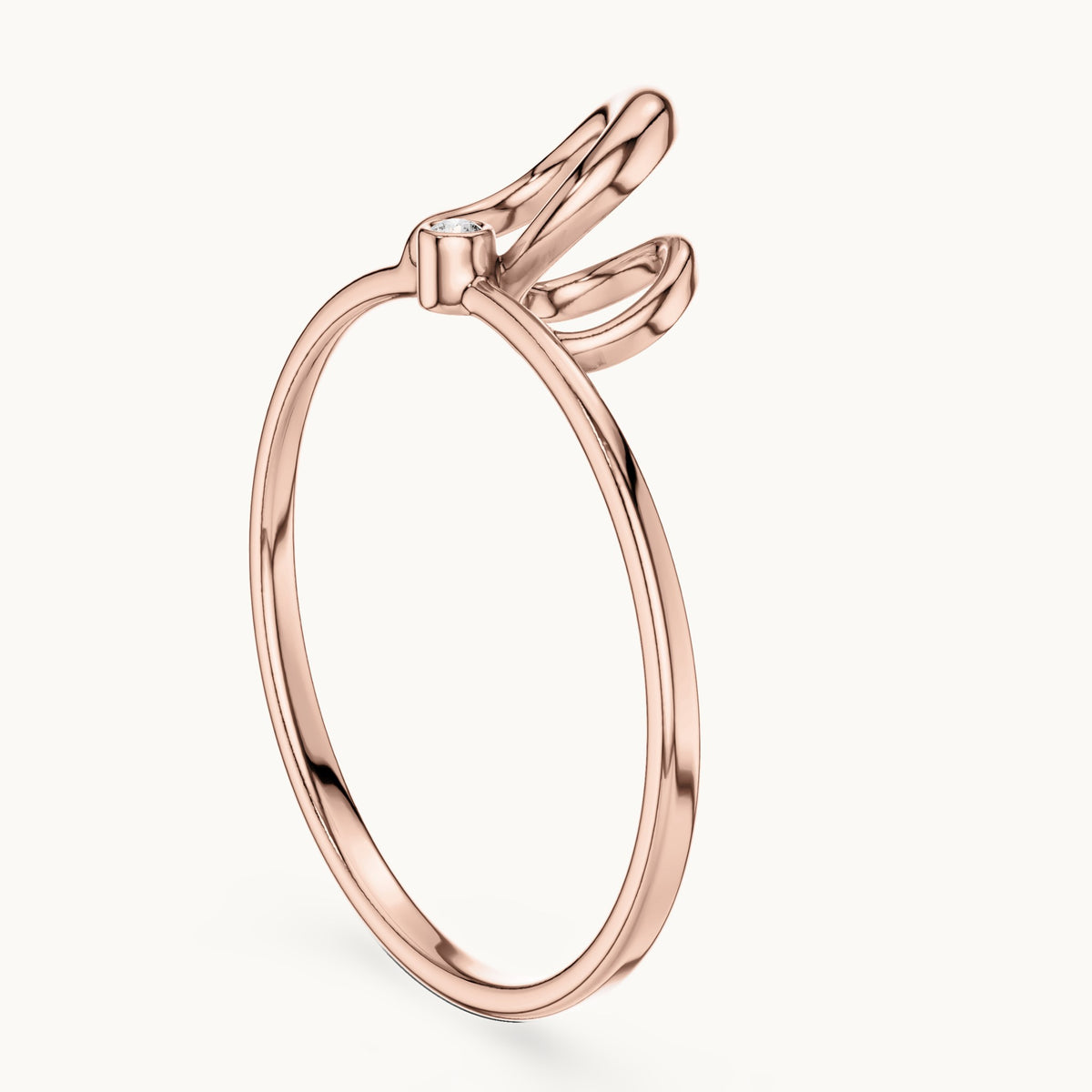 Round lab-grown diamond double loop bezel ring in rose gold, 0.01 CT TW, view 1