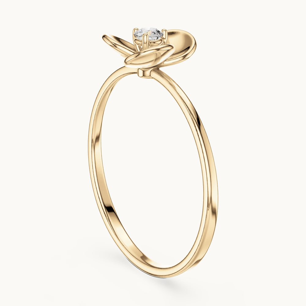 Round lab-grown diamond petal bezel solitaire ring in yellow gold, 0.065 CT TW, view 1