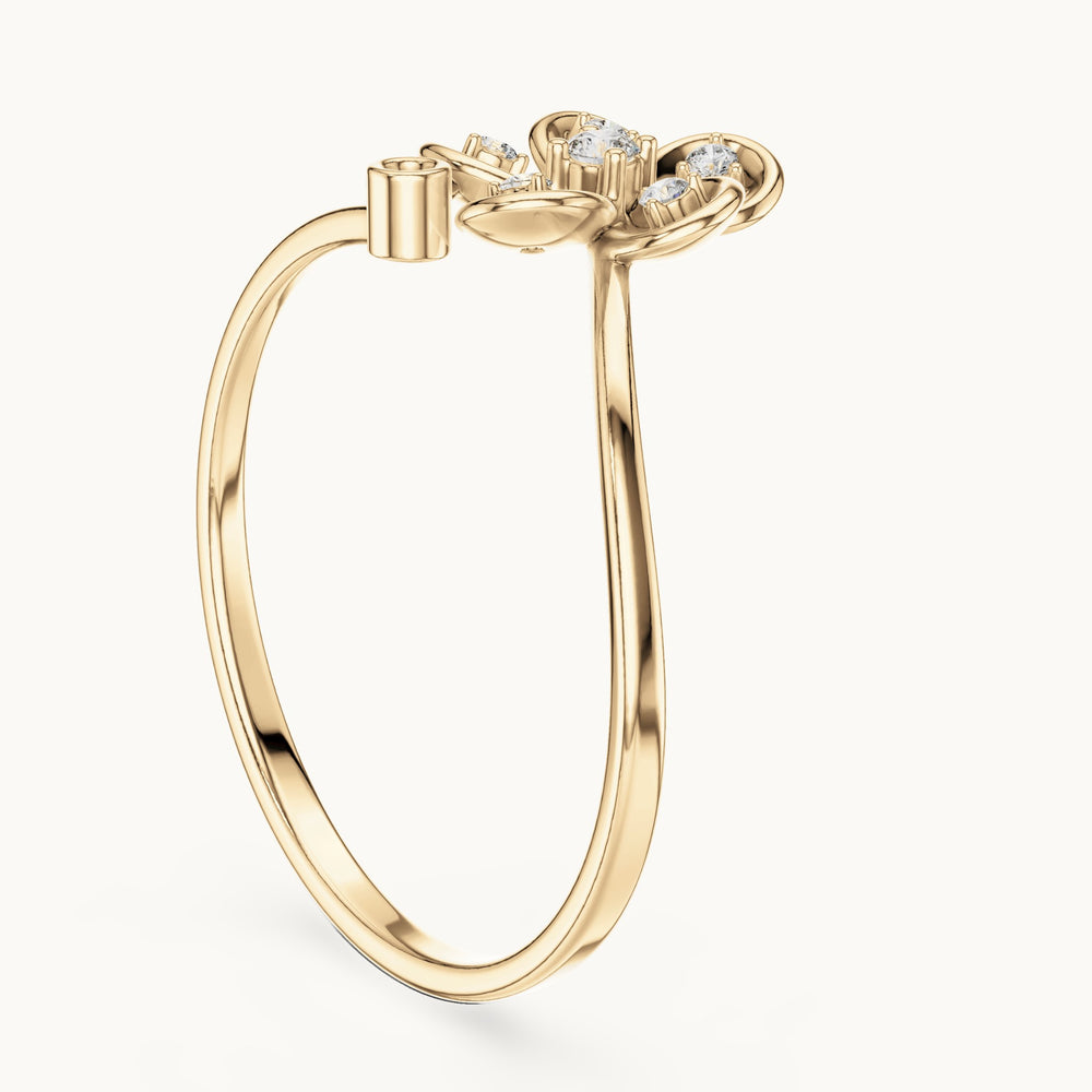 Round lab-grown diamond bezel petal flower bypass ring in yellow gold, 0.055 CT TW, view 1