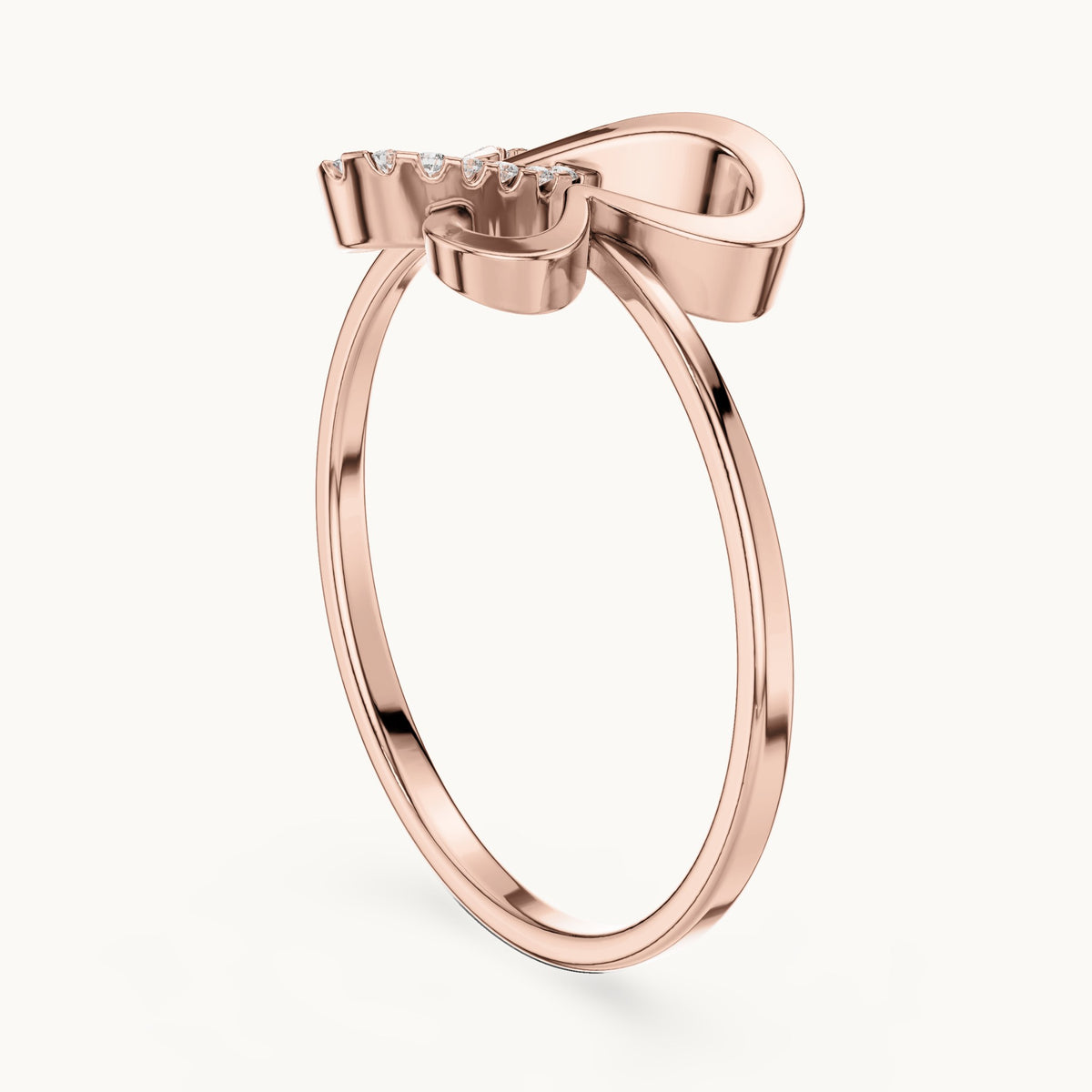 Round lab-grown diamond bow pavé ring in rose gold, 0.078 CT TW, view 1