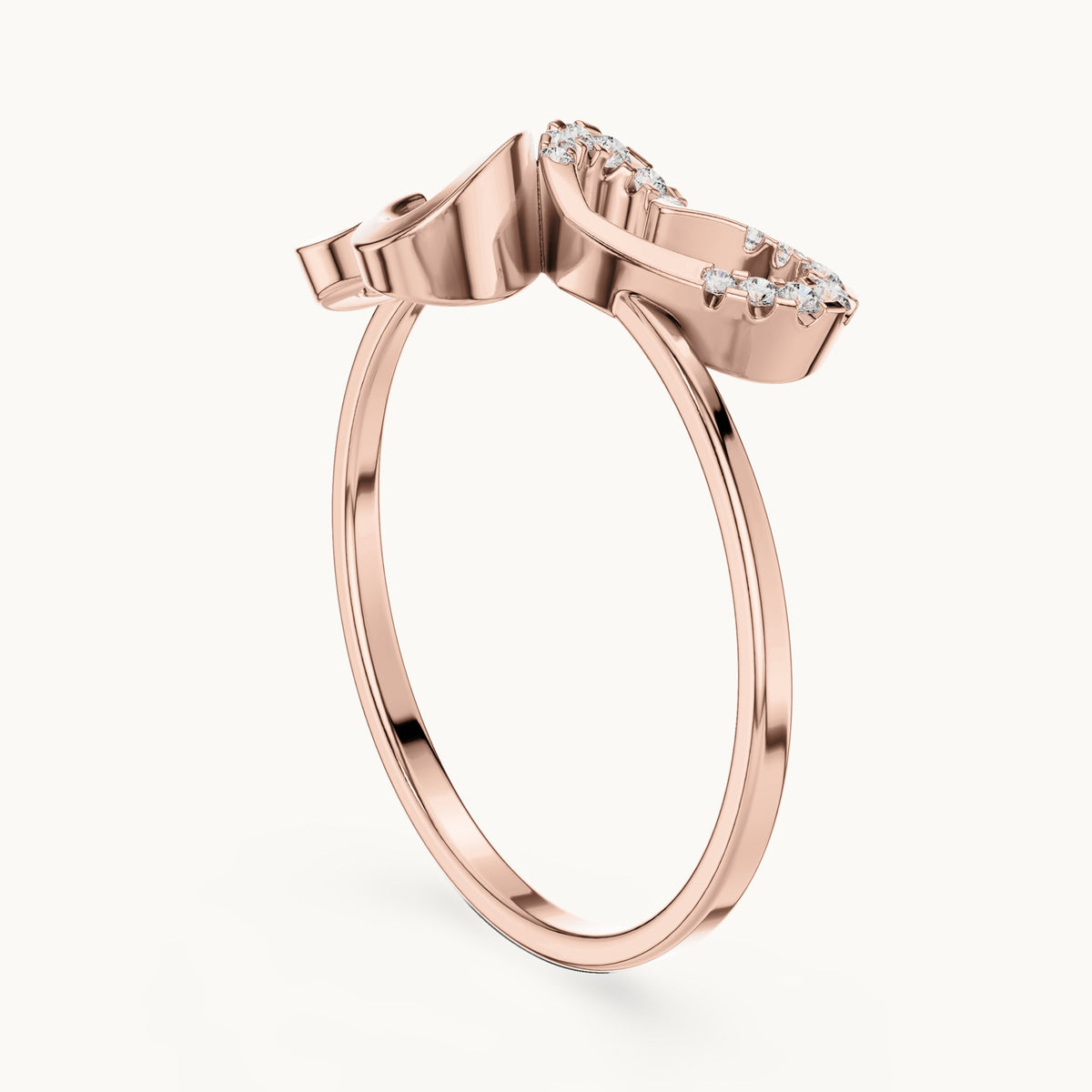 Round lab-grown diamond sculpted leaf swirl ring in rose gold, 0.055 CT TW, view 1