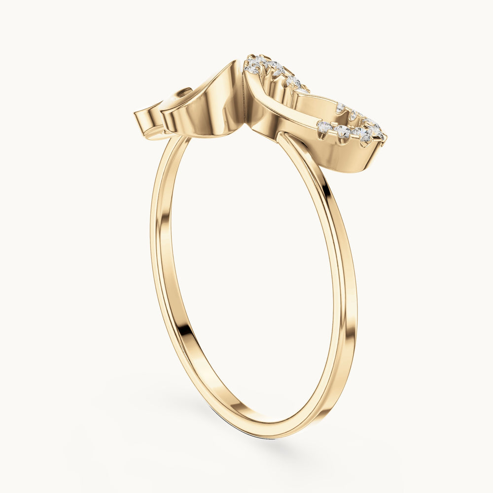 Round lab-grown diamond sculpted leaf swirl ring in yellow gold, 0.055 CT TW, view 1
