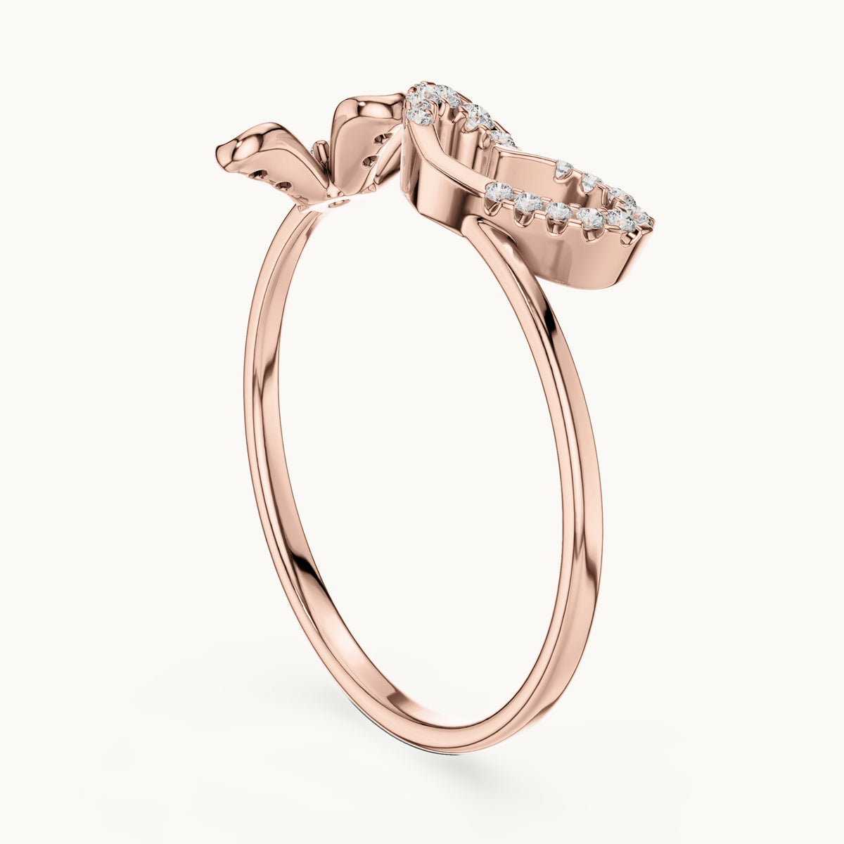 Round lab-grown diamond ribbon swirl ring in rose gold, 0.124 CT TW, view 1