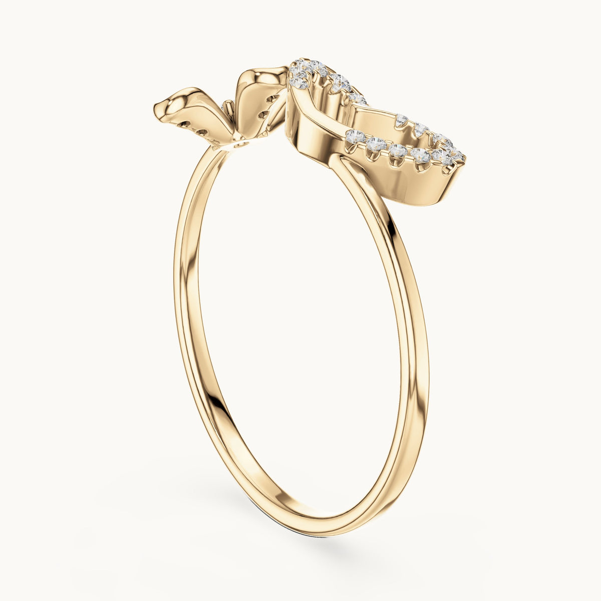 Round lab-grown diamond ribbon swirl ring in yellow gold, 0.124 CT TW, view 1