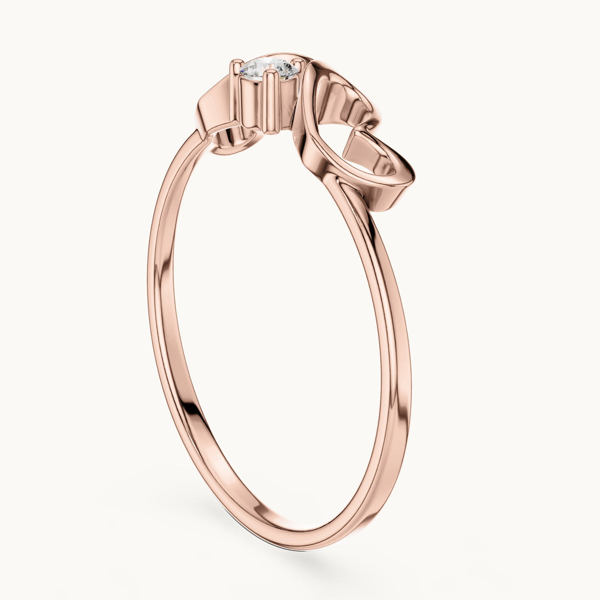 Round lab-grown diamond heart swirl solitaire ring in rose gold, 0.05 CT TW, view 1
