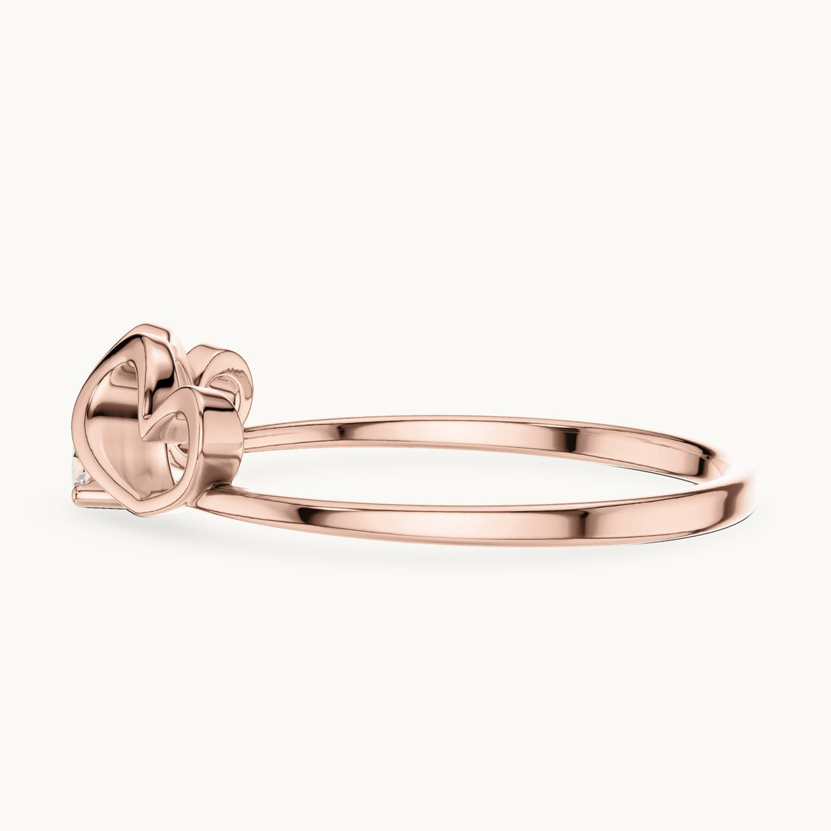 Round lab-grown diamond heart swirl solitaire ring in rose gold, 0.05 CT TW, view 3