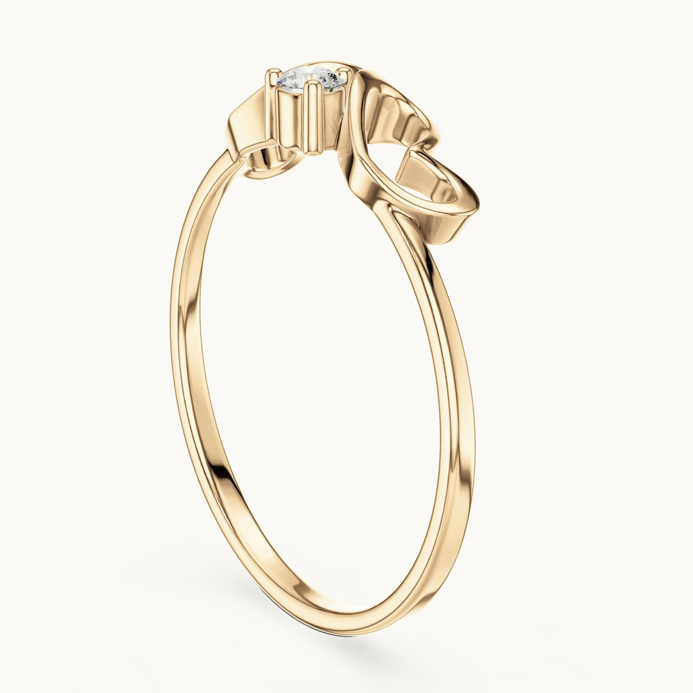 Round lab-grown diamond heart swirl solitaire ring in yellow gold, 0.05 CT TW, view 1