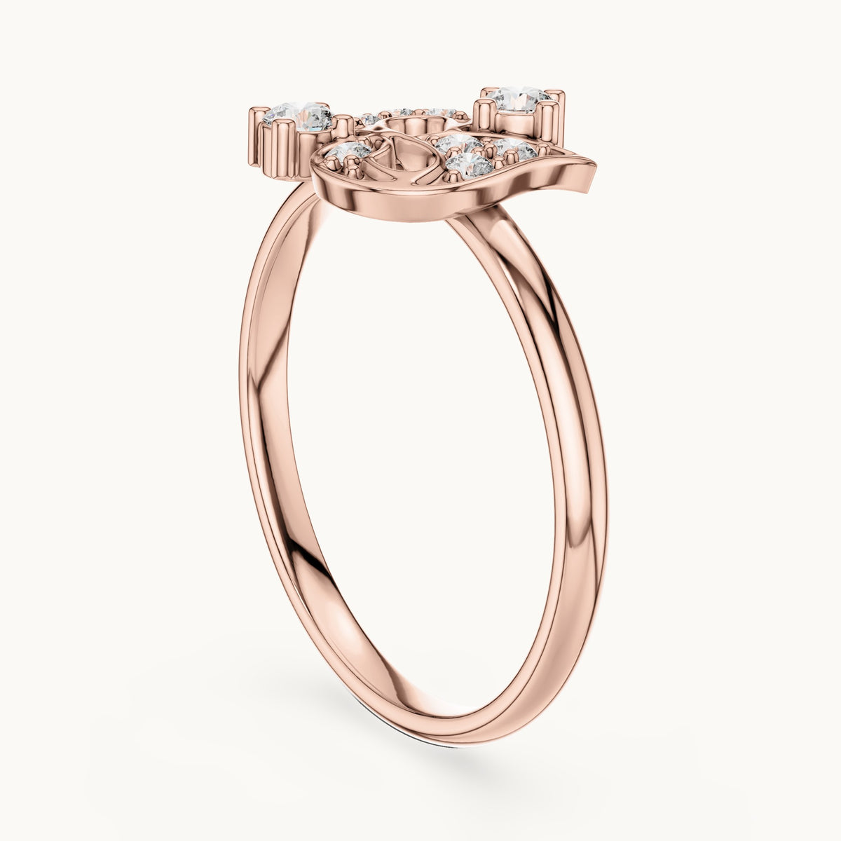 Round lab-grown diamond paisley scroll ring in rose gold, 0.128 CT TW, view 1