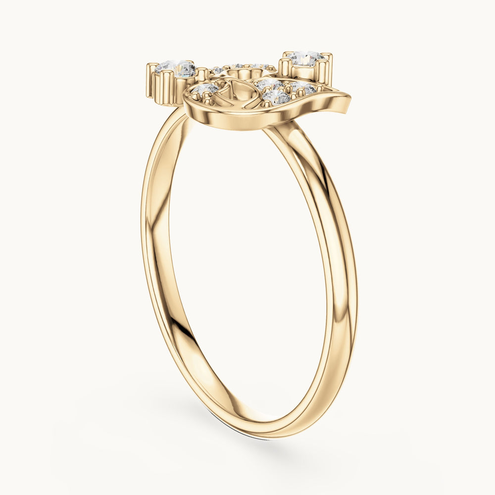 Round lab-grown diamond paisley scroll ring in yellow gold, 0.128 CT TW, view 1