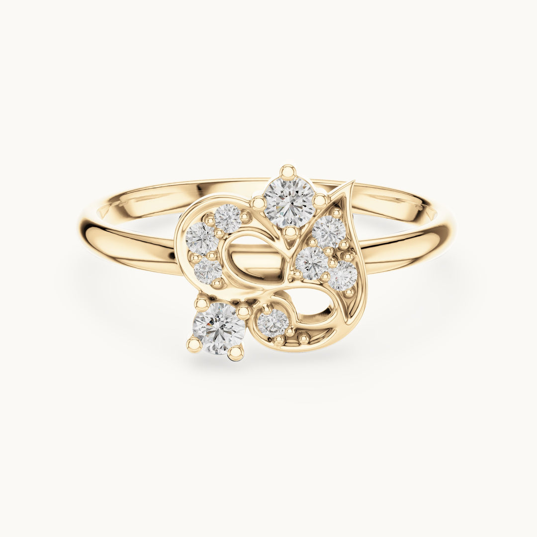 Round lab-grown diamond paisley scroll ring in yellow gold, 0.128 CT TW, view 4
