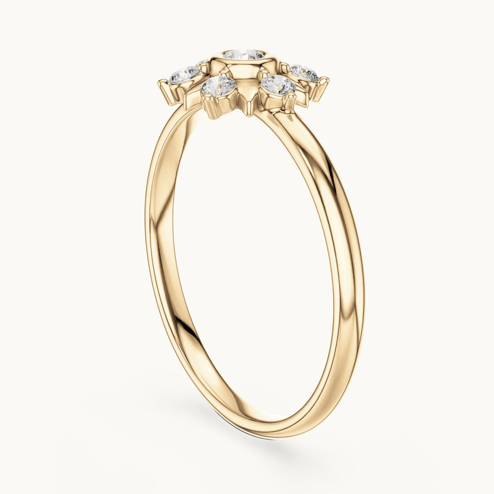 Round lab-grown diamond bezel sun star ring in yellow gold, 0.125 CT TW, view 1