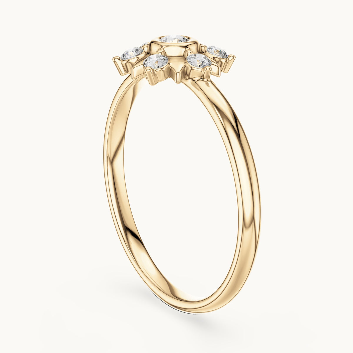 Round lab-grown diamond bezel sun star ring in yellow gold, 0.125 CT TW, view 1