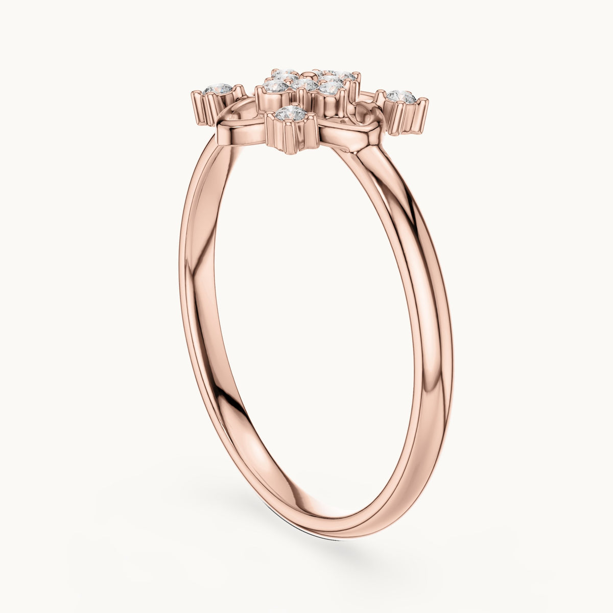 Round lab-grown diamond quatrefoil outline cluster ring in rose gold, 0.064 CT TW, view 1