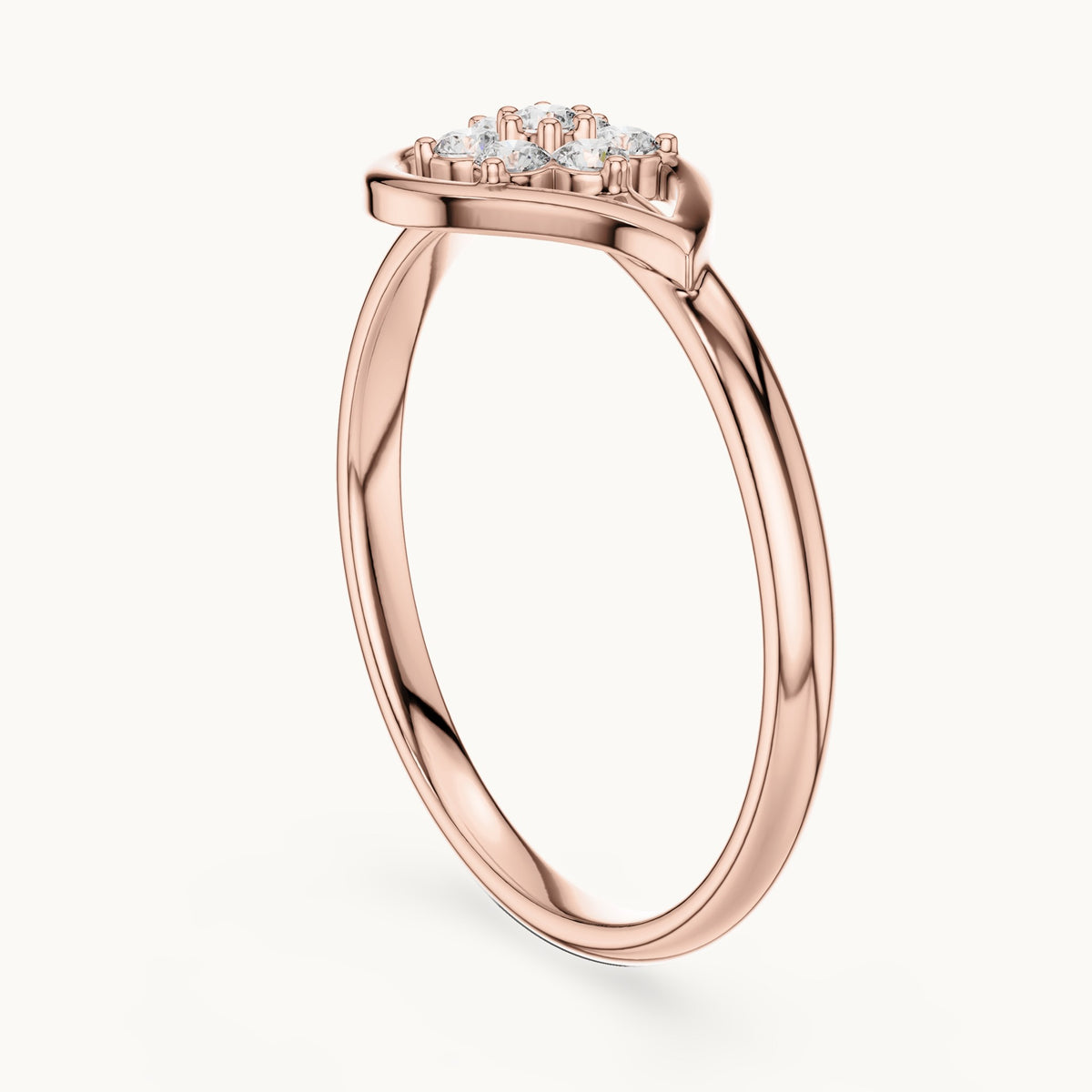 Round lab-grown diamond heart swirl cluster ring in rose gold, 0.105 CT TW, view 1