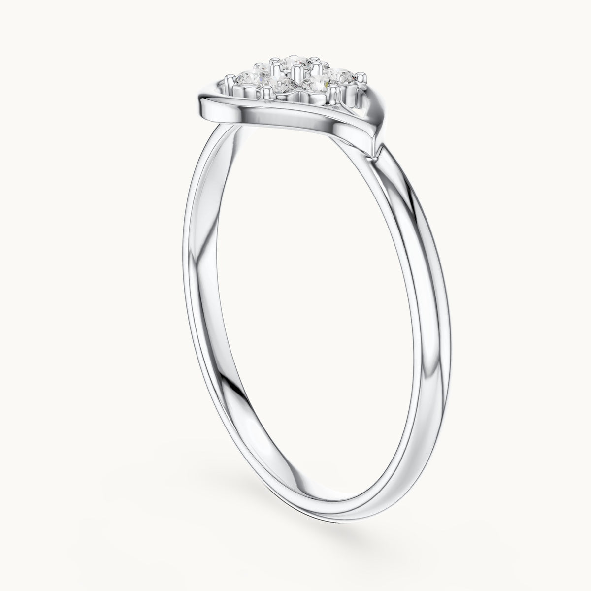Round lab-grown diamond heart swirl cluster ring in white gold, 0.105 CT TW, view 1