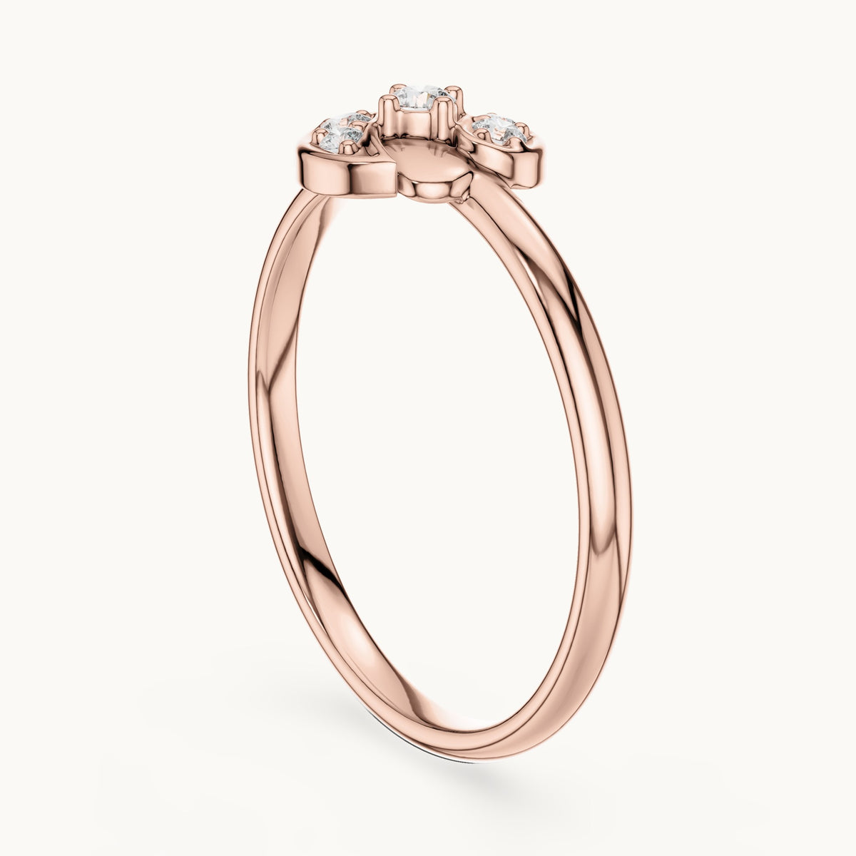 Round lab-grown diamond twin petal swirl ring in rose gold, 0.056 CT TW, view 1