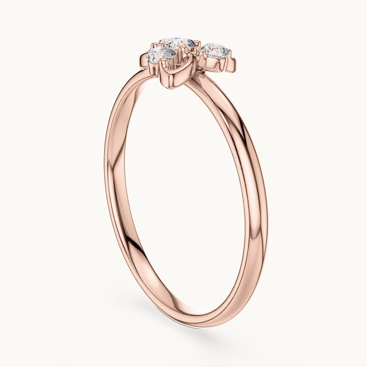 Round lab-grown diamond four-stone swirl cluster ring in rose gold, 0.06 CT TW, view 1
