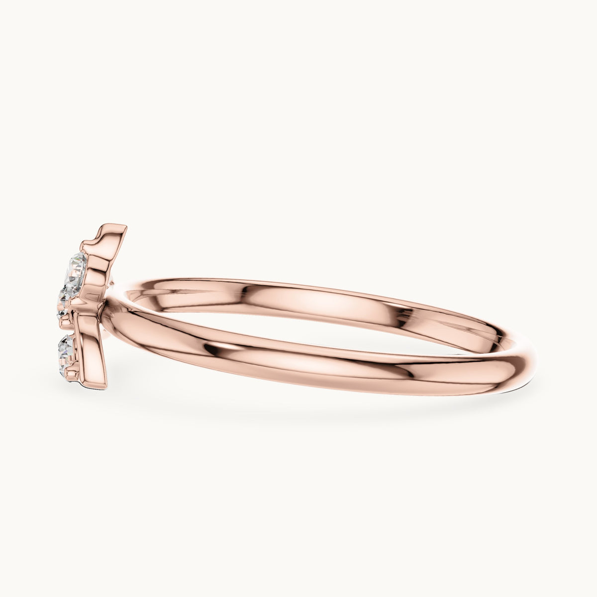 Round lab-grown diamond four-stone swirl cluster ring in rose gold, 0.06 CT TW, view 3