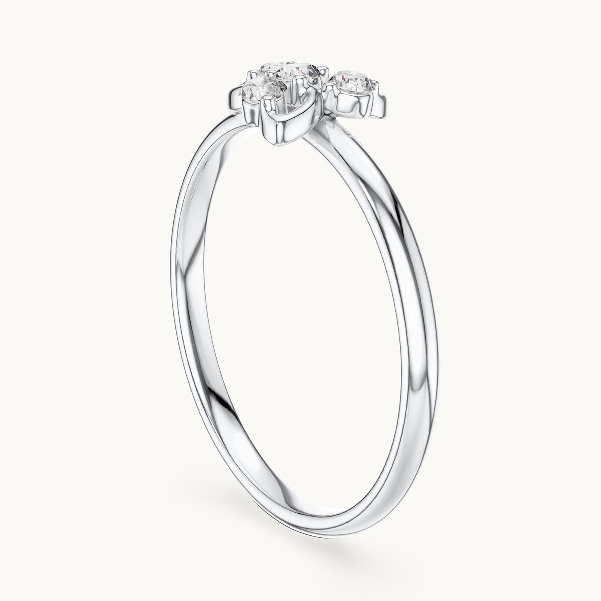 Round lab-grown diamond four-stone swirl cluster ring in white gold, 0.06 CT TW, view 1