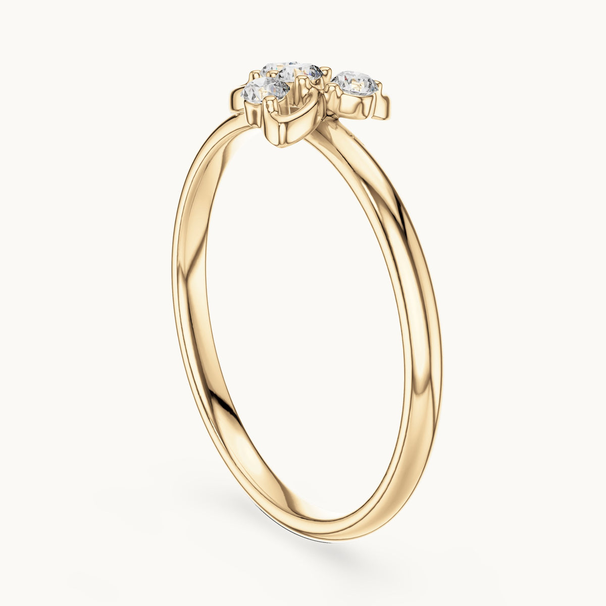 Round lab-grown diamond four-stone swirl cluster ring in yellow gold, 0.06 CT TW, view 1