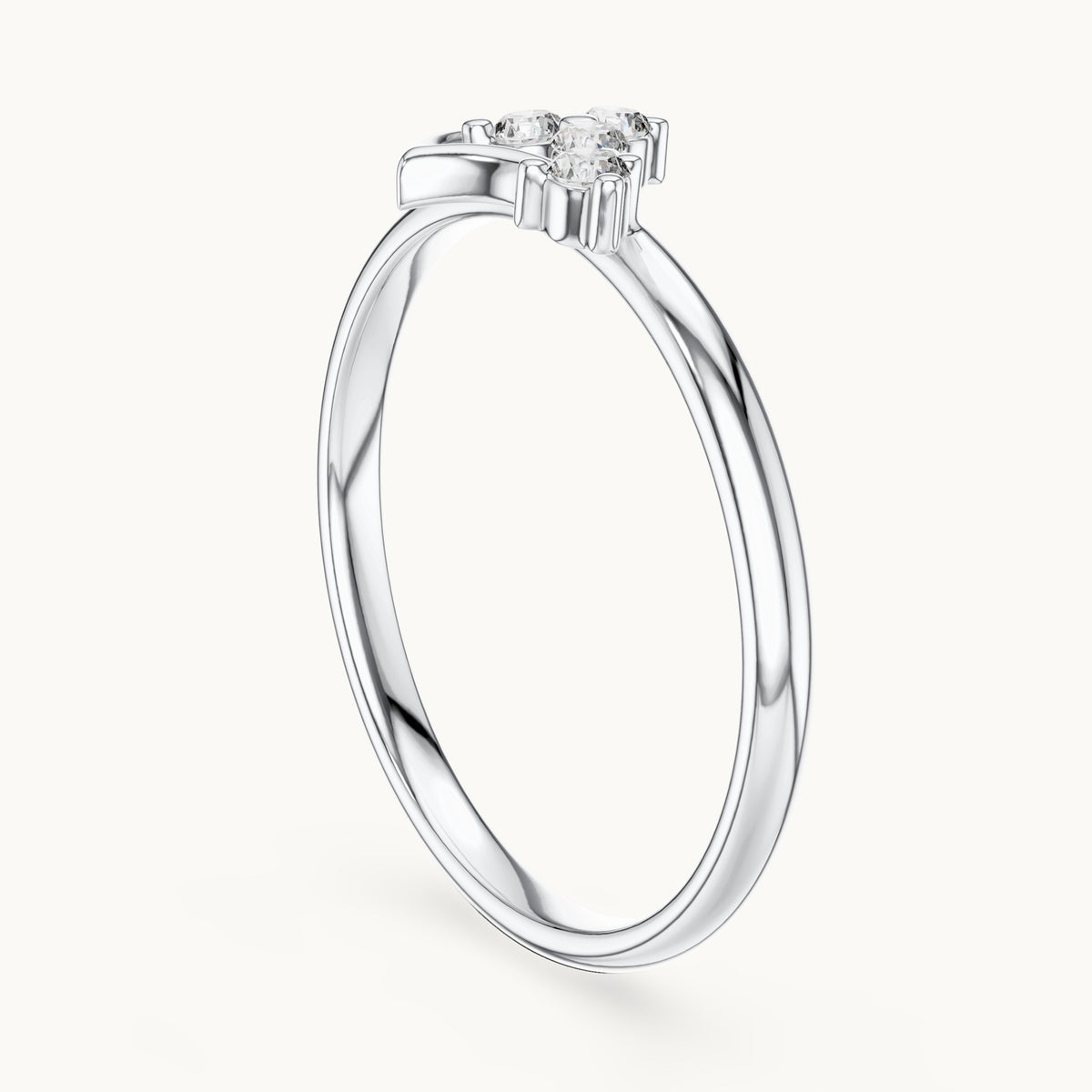 Round lab-grown diamond four-stone heart swirl ring in white gold, 0.063 CT TW, view 1