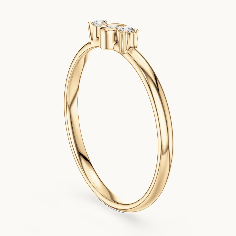 Round lab-grown diamond three-stone scroll ring in yellow gold, 0.03 CT TW, view 1