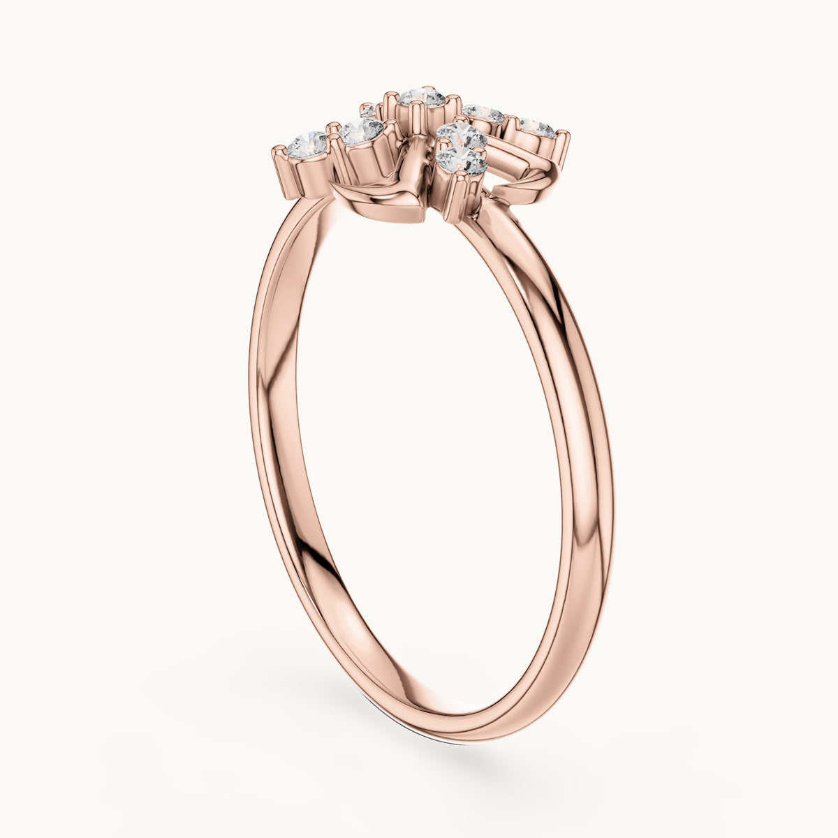Round lab-grown diamond pinwheel cluster ring in rose gold, 0.09 CT TW, view 1