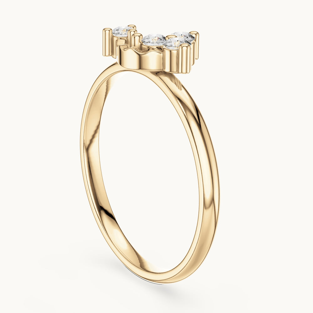 Round lab-grown diamond four-stone bypass cluster ring in yellow gold, 0.13 CT TW, view 1
