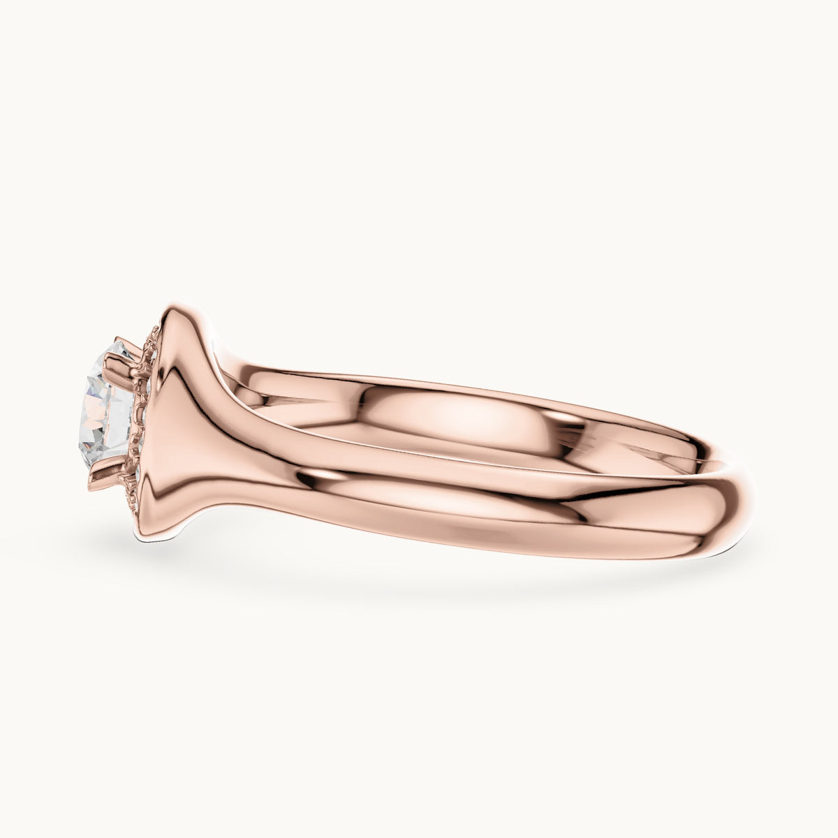 Round lab-grown diamond halo engagement ring with tapered band in rose gold, 0.59 CT TW, view 3