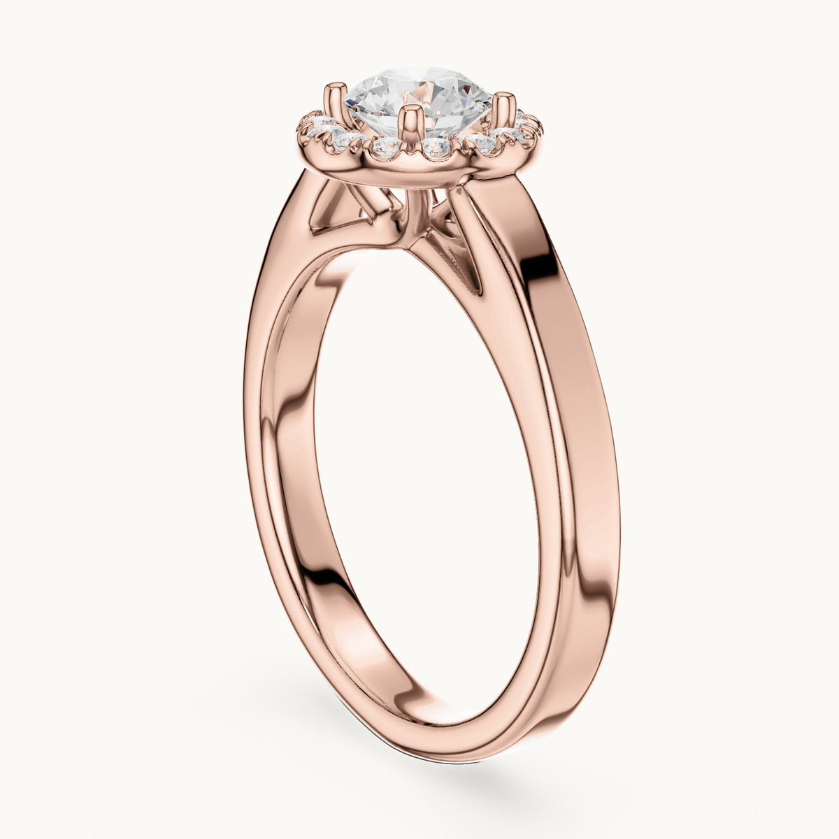 Round lab-grown diamond halo engagement ring in rose gold, 0.818 CT TW, view 1