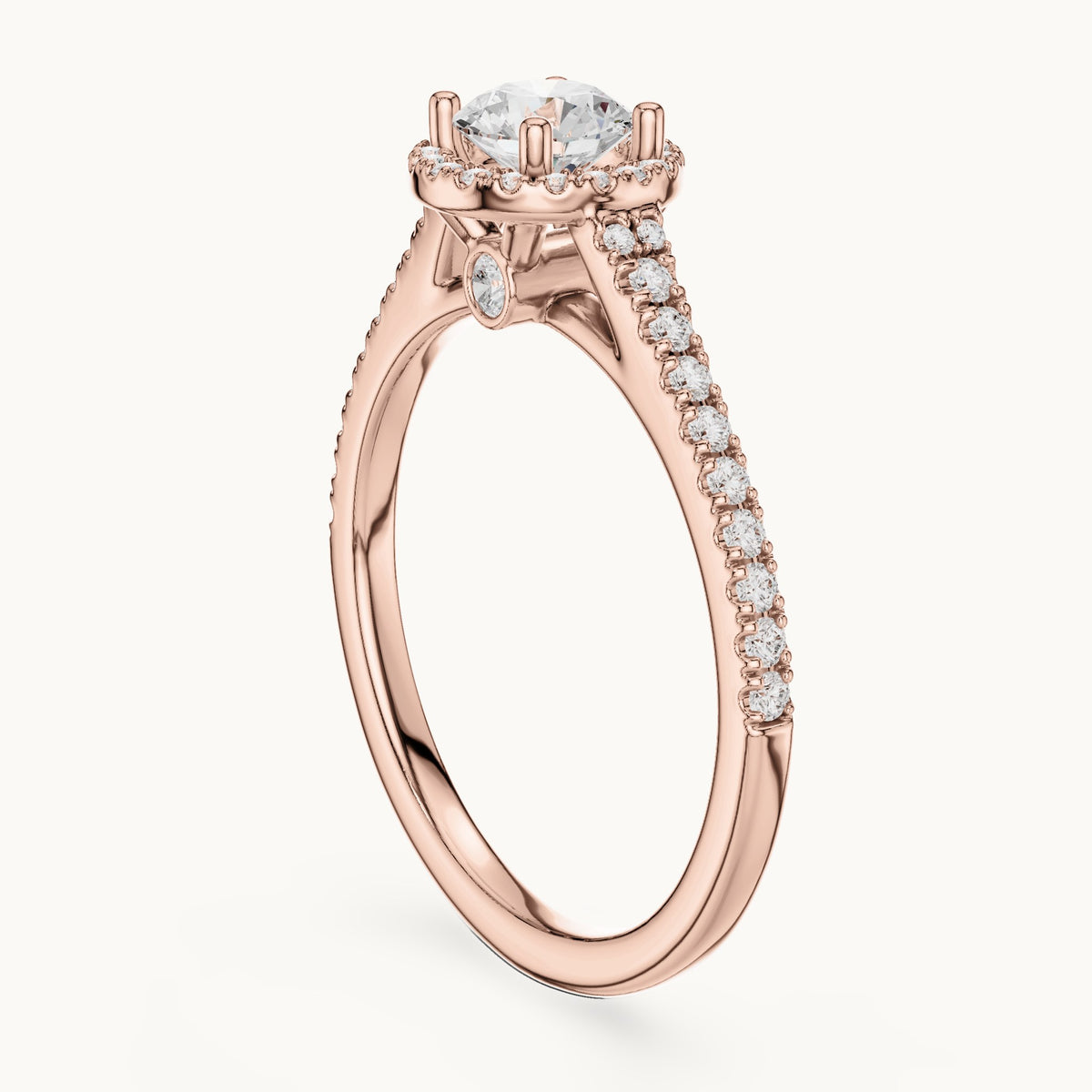 Round lab-grown diamond petite halo engagement ring in rose gold, 0.83 CT TW, view 1