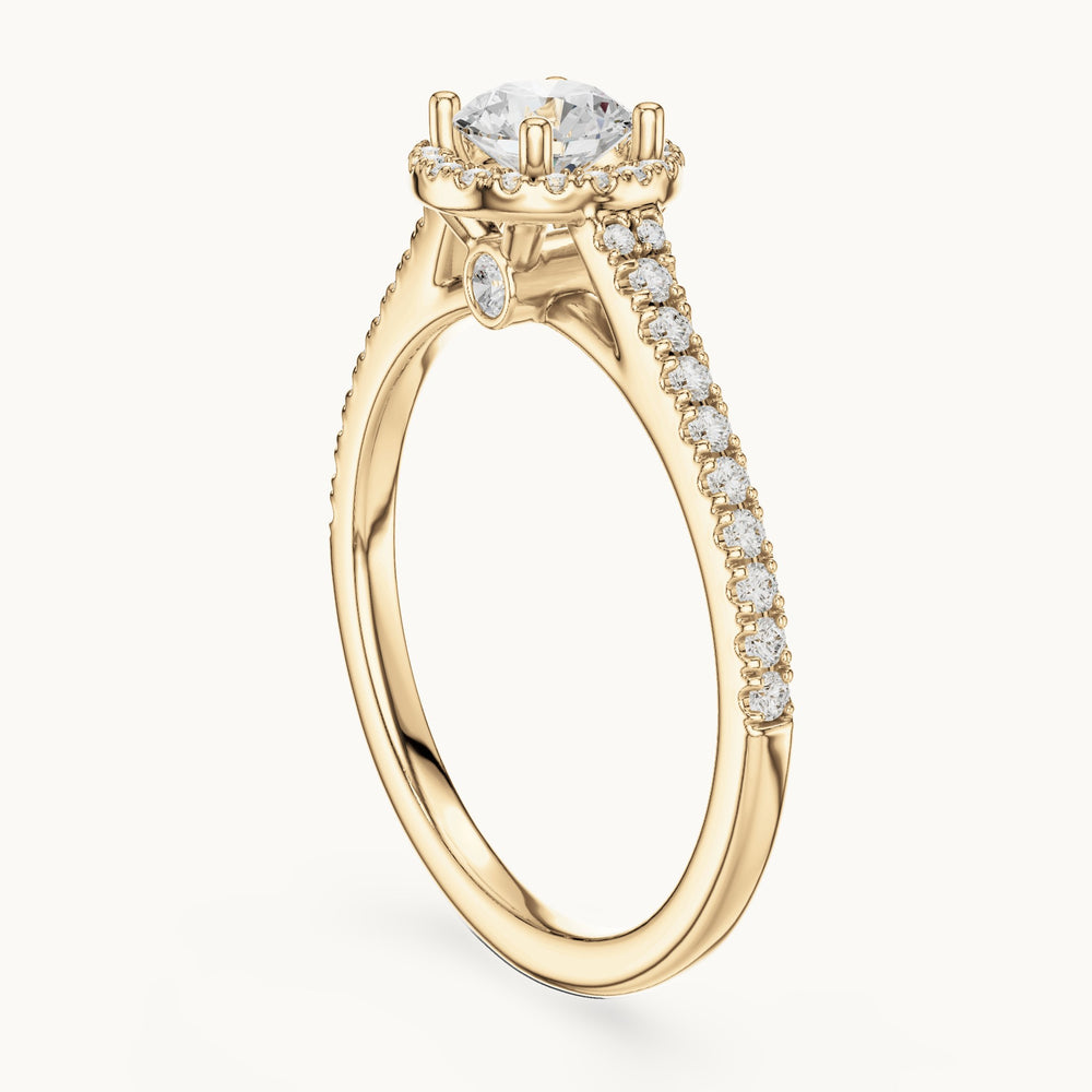 Round lab-grown diamond petite halo engagement ring in yellow gold, 0.83 CT TW, view 1