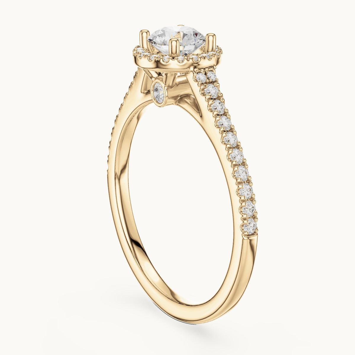 Round lab-grown diamond petite halo engagement ring in yellow gold, 0.83 CT TW, view 1