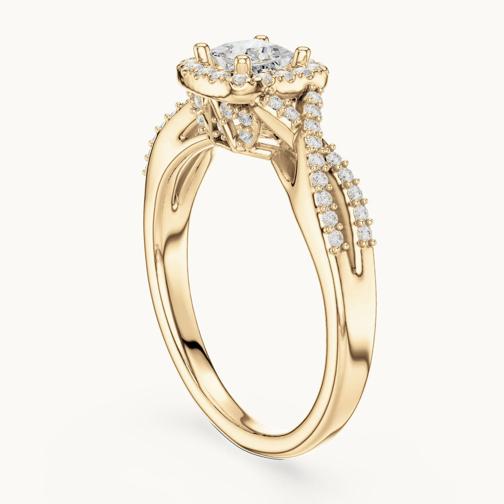 Round and princess-cut lab-grown diamond twisted halo engagement ring in yellow gold, 0.688 CT TW, view 1