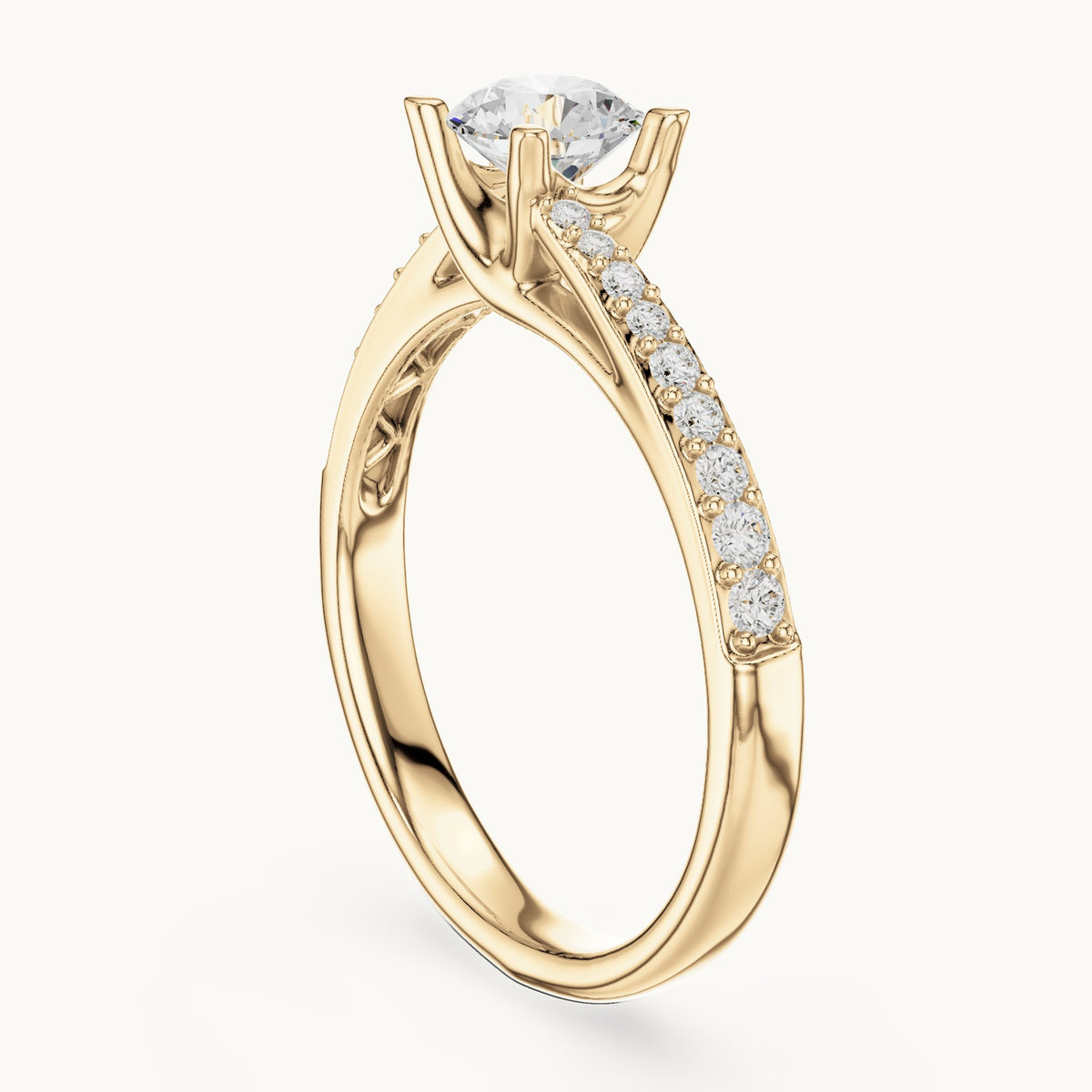 Round lab-grown diamond bypass solitaire engagement ring with pavé shoulders in yellow gold, 0.82 CT TW, view 1