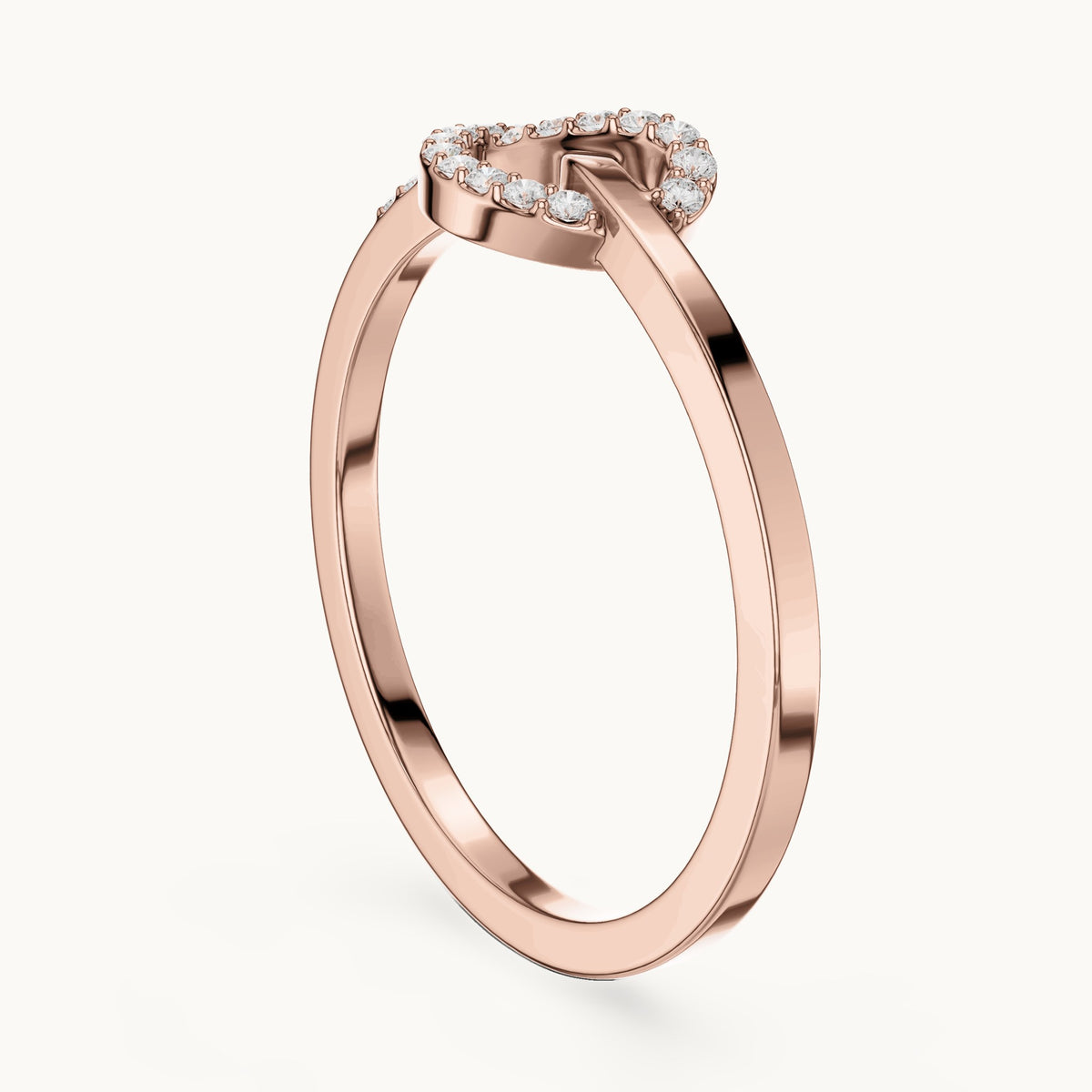 Round lab-grown diamond love knot pavé ring in rose gold, 0.10 CT TW, view 1