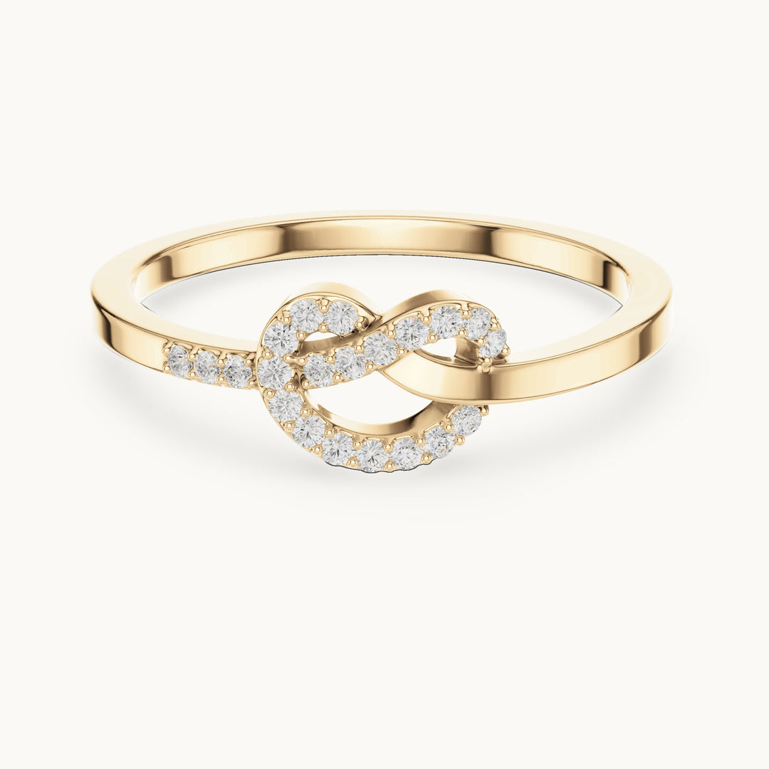 Round lab-grown diamond love knot pavé ring in yellow gold, 0.10 CT TW, view 4