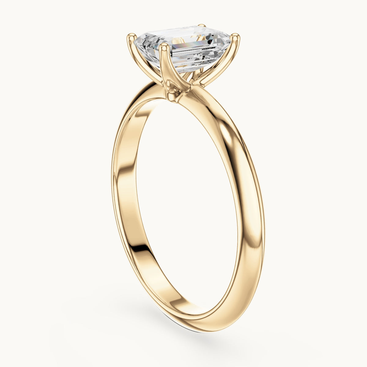Emerald-cut lab-grown diamond classic prong solitaire engagement ring in yellow gold, 1.00 CT TW, view 1